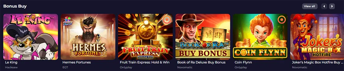 Bonus Buy slot games section featuring Le King, Hermes Fortunes, Fruit Train Express: Hold & Win, Book of Ra Deluxe Buy Bonus, Coin Flynn, and Joker’s Magic Box Hotfire, with a “View all” button on a dark casino interface.